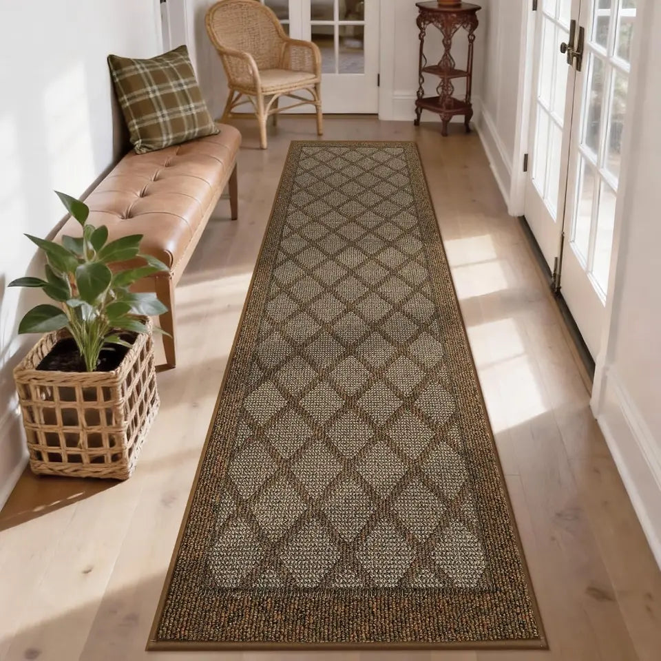 Long diamond-patterned rug on a wooden floor with a bench, plant, and door in the background.