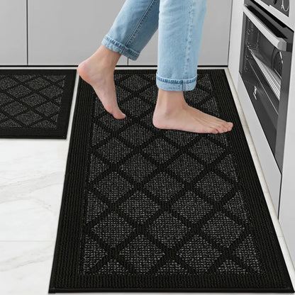 Person stepping onto a black textured mat in a kitchen setting