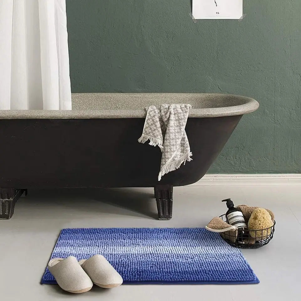 Blue Gradient Stripe Bath Rug in front of Tub