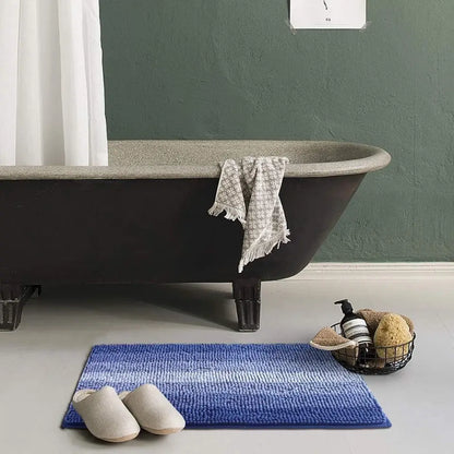 Blue Gradient Stripe Bath Rug in front of Tub